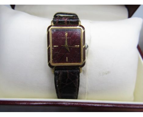 Orient watch with deep red face and strap in Rotary gift box