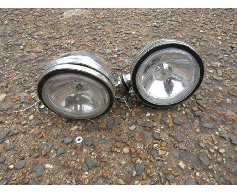 2 vintage chrome headlamps