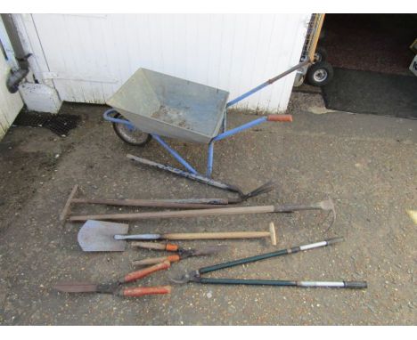 Wheelbarrow and garden tools&nbsp;