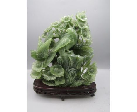 Carved Jade blossom tree with birds on a wooden plinth approx 10"W x 11"H