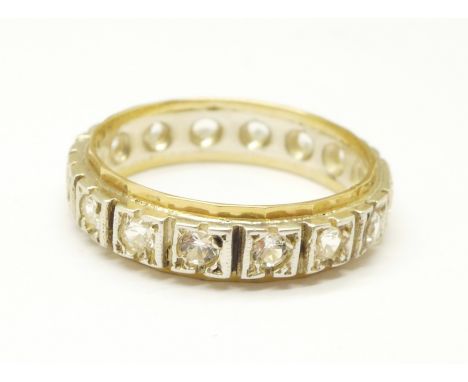 A 9ct gold and silver white stone set eternity ring, O 