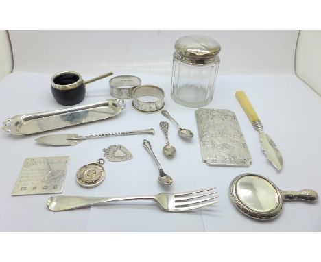 Silver items including napkin rings, fobs, salt spoons, small mirror, a Victorian fork, tray, two butter knives, etc., weigha