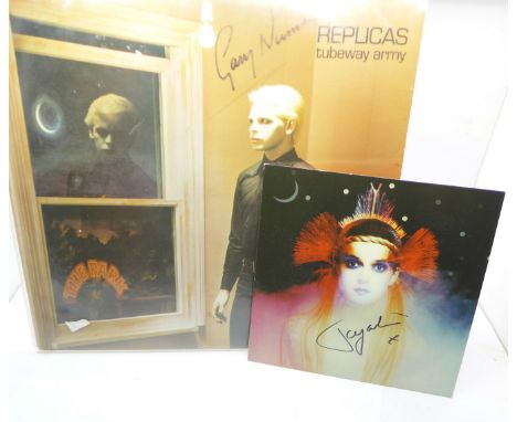 An autographed Tubeway Army LP record by Gary Numan and an autographed 7" single by Toyah 