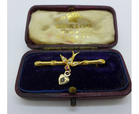 A 9ct gold, pearl, ruby and diamond bird brooch in a fitted case, 1.3g 