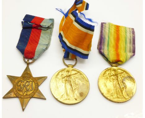 Two WWI Victory medals; 26107 Pte. H.J. Lacey Norf. R. and 19323 Pte. J.W. Houghton Linc. R., and two WWII medals 