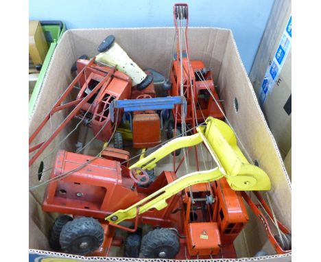 Six Tri-ang pressed steel model cranes and bulldozers 