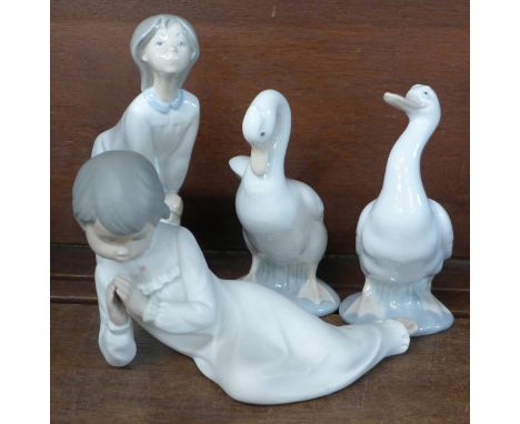 A Lladro figure and three Nao figures 