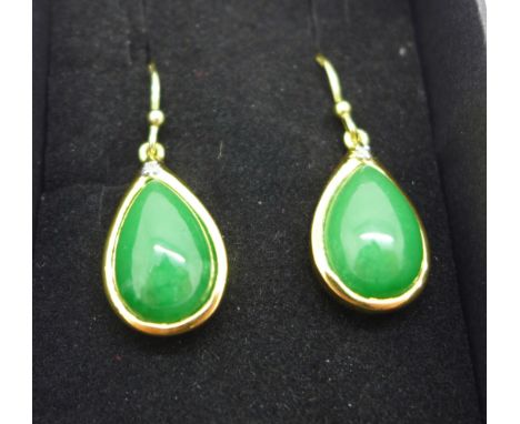 A pair of silver gilt, jade and diamond earrings 