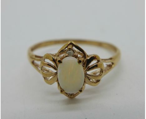 A 9ct gold, opal and diamond ring, 0.9g, P 