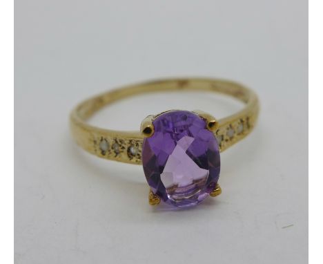 A 9ct gold, amethyst and diamond ring, 1.1g, O 