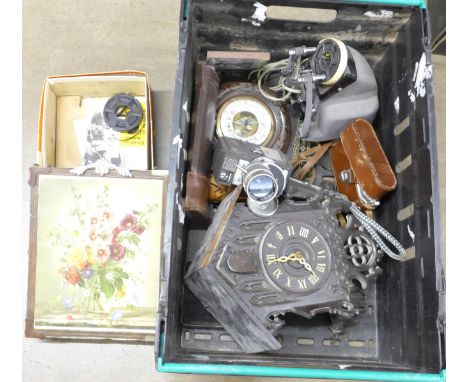 A cuckoo clock, a Prinz cine camera, a barometer, a camera, etc. 