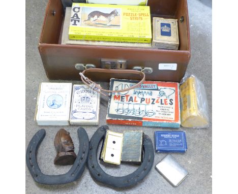 A case containing playing cards, cribbage board, etc. 