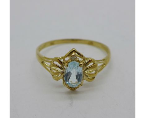 A 9ct gold and blue stone ring, 0.9g, P 