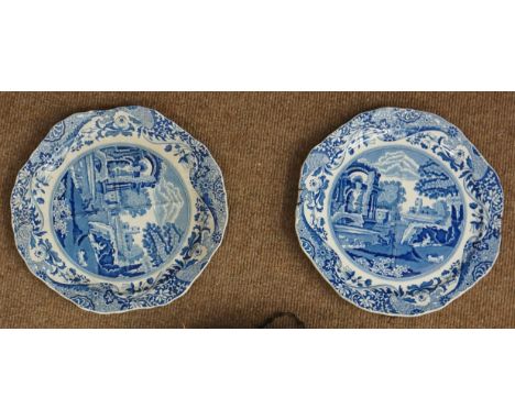 A pair of blue and white plates, the central bodies quartered by raised partitions, bases marked Copeland Spode, one with met