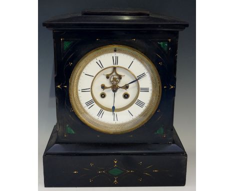 A Victorian black slate mantel clock of architectural form, the shallow canted top centred on a square pediment above a front