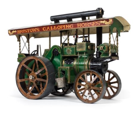 *Traction engine. A well-made model tinplate steam traction engine,  the canopy inscribed 'Bristows Galloping Horses, green b