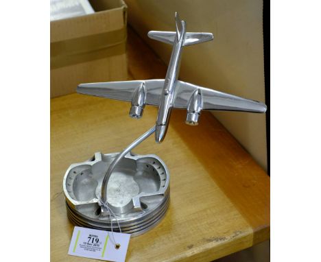 *Desktop model. A WWII RAF chrome alloy heavy Wellington bomber,  23cm wingspan, mounted on engine piston head base, together