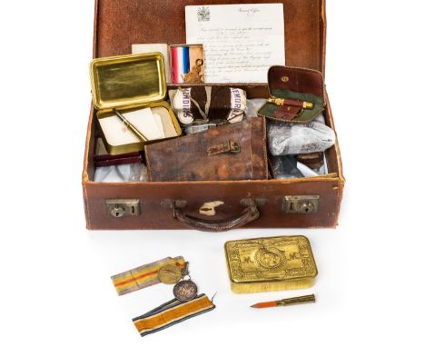 *Moore Family Archive. A brown leather case containing items belonging to Company Sergeant Major Wilfred Howard Moore, Durham