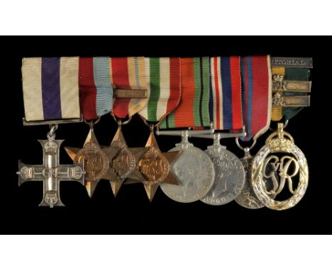 *WWII. A group of items from the estate of Joseph Joylon Dean,  comprising an unattributable WWII Military Cross group, Milit