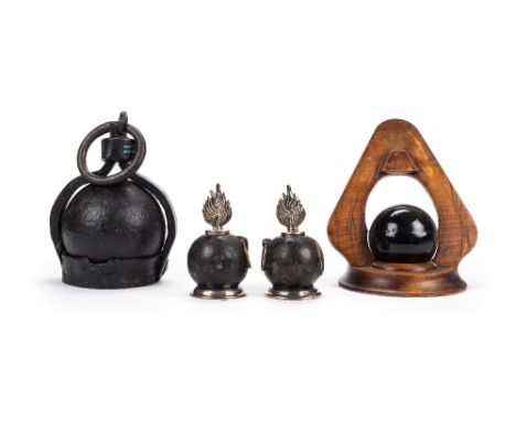 *Cannon ball. A pair of presentation pieces made from cannon balls each with a silver plated flame finial and base with ring 