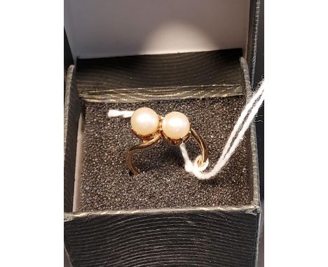 A London 9ct yellow gold and two pearl set ring. [Ring size K] [2.89Grams] 