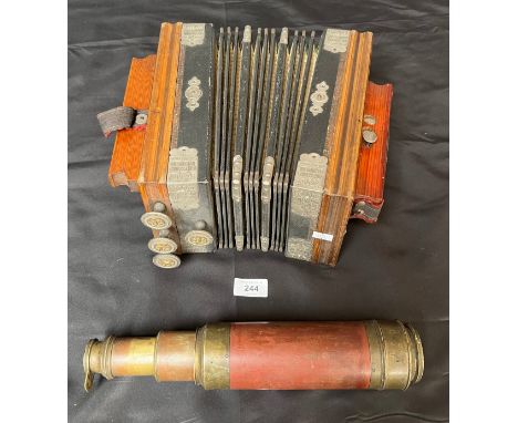 A Vintage Richter accordion squeeze box. Together with a brass and wood three pull scope. 