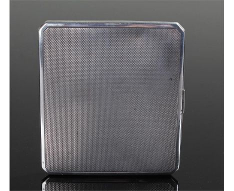 George VI silver cigarette case, London 1938, maker S.J.R, the engine turned case with canted corners, 85 grams