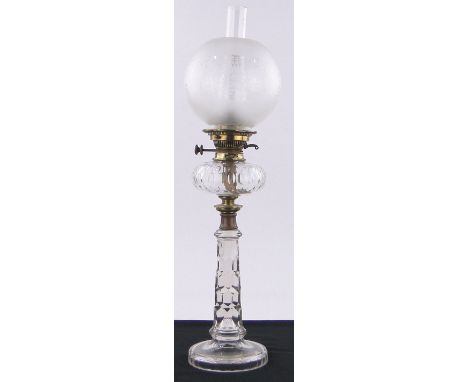 A 19th century cut-glass oil lamp,with etched glass shade, height 29".