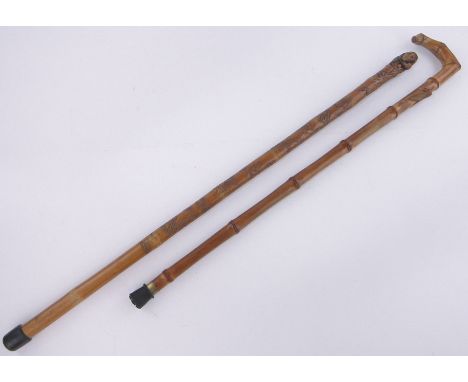 A Chinese relief carved bamboo walking cane with monkey finial,and a bamboo walking stick with carved cicada, (2).
