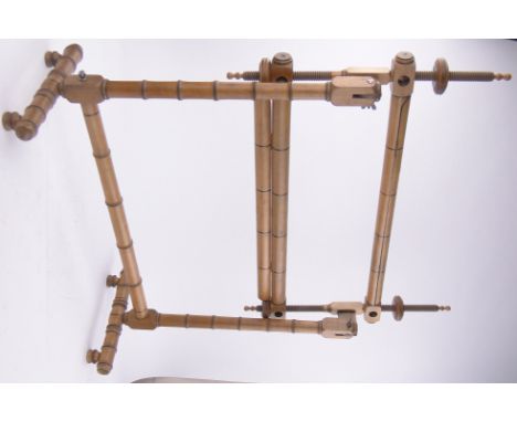 A Victorian tapestry stretcher stand.