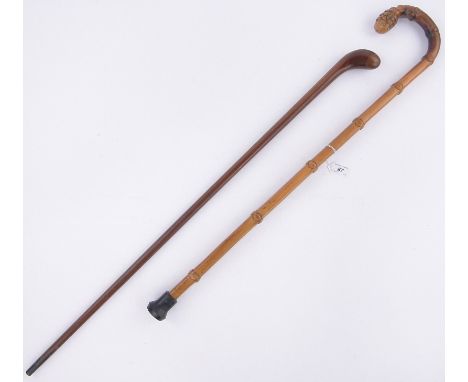 A laminate wood walking stick,possibly made from an aircraft propeller and a Chinese bamboo walking stick, (2).