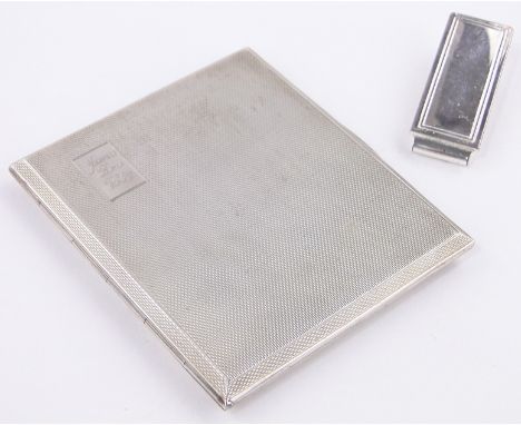 An engine turned silver cigarette case,Birmingham 1962, and a silver moneyclip, (2).