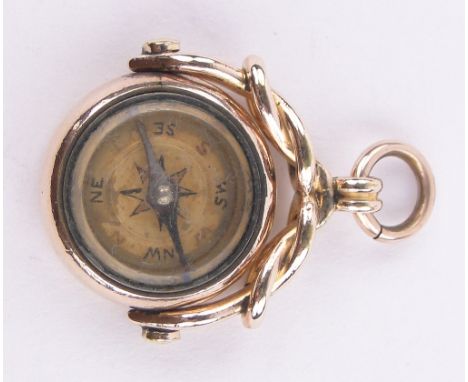 A gold compass watch fob,with bloodstone back.