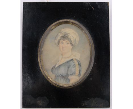 A 19th century watercolour miniature portrait on ivory of a lady,height 3.5", framed.