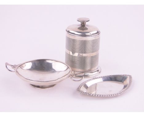 An engine turned silver cigarette dispenser,and 2 small silver dishes, (3).