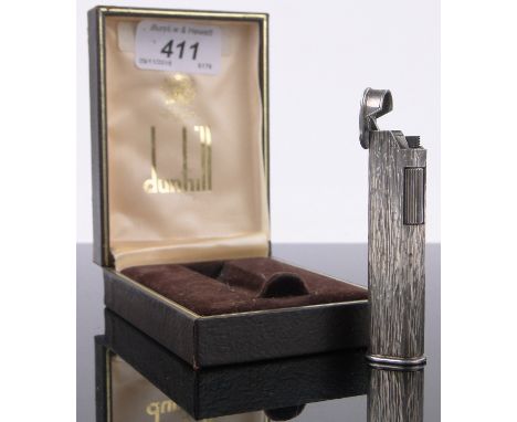 A Vintage cased Dunhill pocket lighter,2.75".