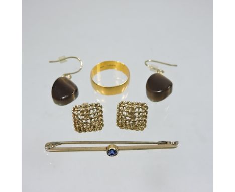 A 22 carat gold wedding band, together with a pair of 9 carat gold earrings, a stick pin and a pair of gemstone earrings