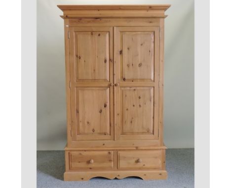 A pine double wardrobe, 129cm