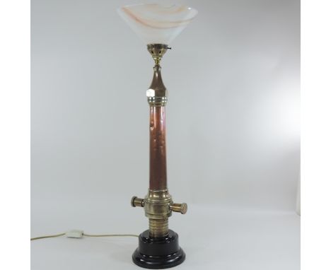 A table lamp in the form of a fireman's hose nozzle, 78cm high