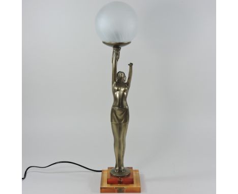 An Art Deco style figural table lamp, with a white glass shade, 58cm high overall