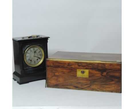 A Victorian black slate mantel clock, 27cm high, together with a Victorian walnut writing slope, 51cm