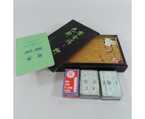 A mahjong set, together with mahjong playing cards