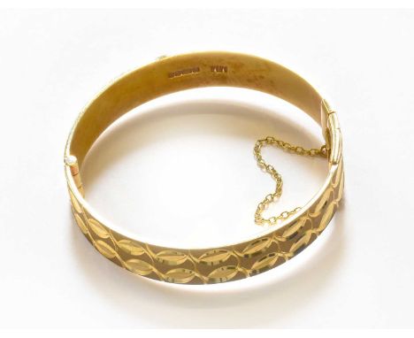 A 9 Carat Gold Bangle, inner measurements 5.8cm by 5.6cmGross weight 31.0 grams.