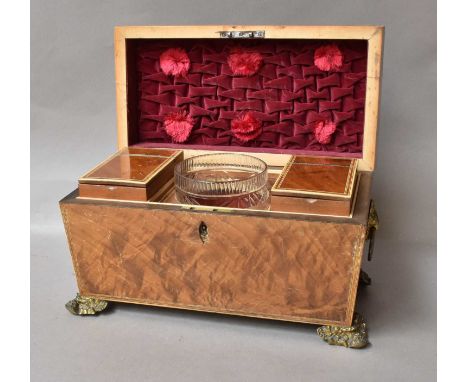 An Early Victorian Mahogany Tea Caddy, banded in satinwood, with fitted interior including a central mixing bowl, and having 