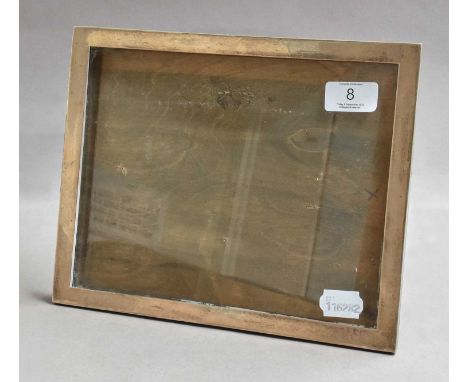A George V Silver Photograph-Frame, by Sanders and Mackenzie, Birmingham, 1921, oblong and with plain silver sides and wood e