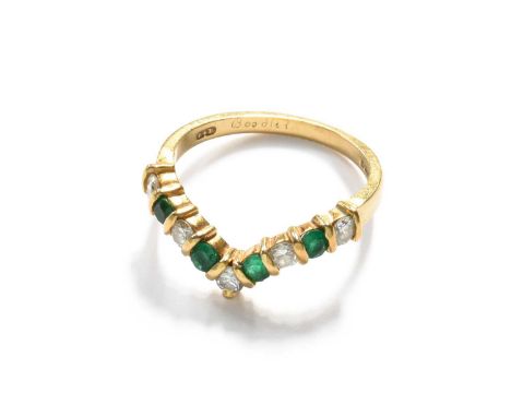 An 18 Carat Gold Emerald and Diamond Wishbone Ring, by Boodles &amp; Dunthorne, five round brilliant cut diamonds alternate w