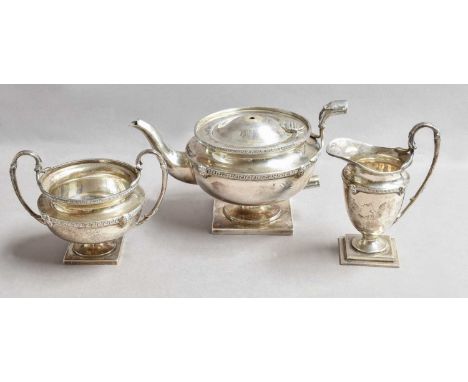 A Three-Piece George V Silver Tea-Service, by Goldsmiths and Silversmiths Co. Ltd., London, 1913, each piece tapering and wit