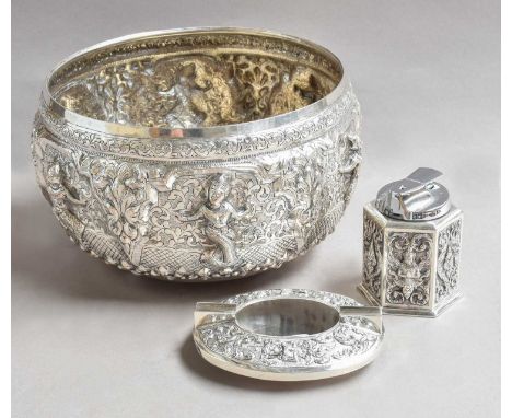 A Thai Bowl, chased with dieties within foliage scrolls, 23.4cm diameter; Together With A Thai ashtray and table-lighter, eac