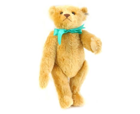 A Steiff British Collectors 1907 replica Teddy bear, limited edition number 1055/2000, 55cm high, partially boxed.