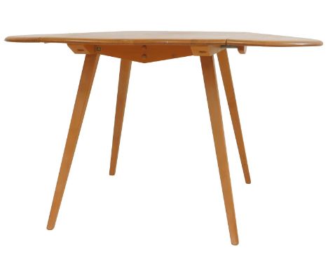An Ercol elm drop leaf dining table, the top with a rounded edge, raised on square tapering out swept legs, model number 384,